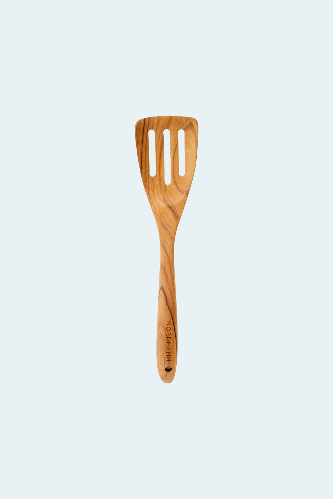 Perforerad stekspade, 30 cm, i teak mot ljus bakgrund