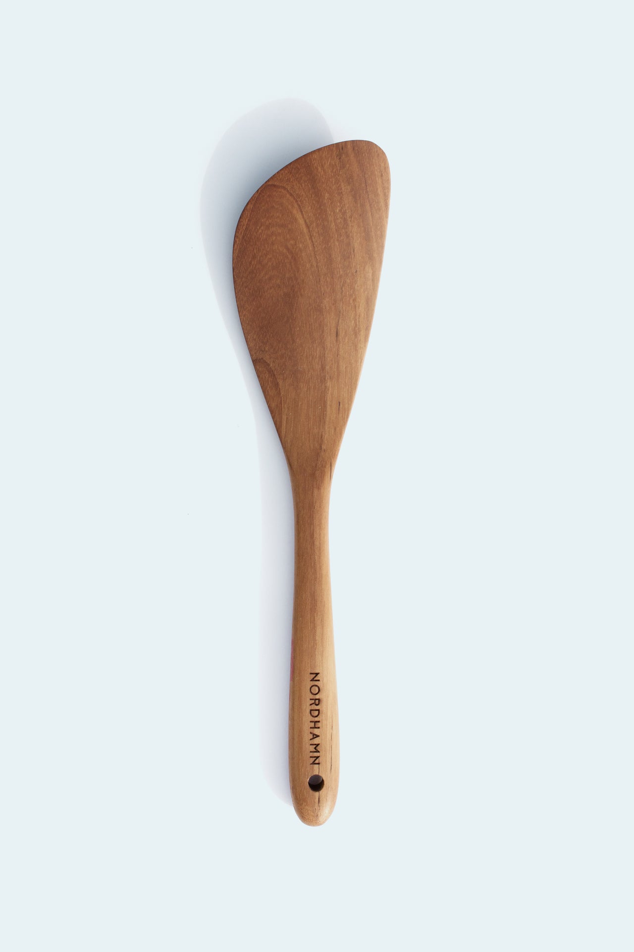 Stekspatel, 34 cm, i teak mot ljus bakgrund
