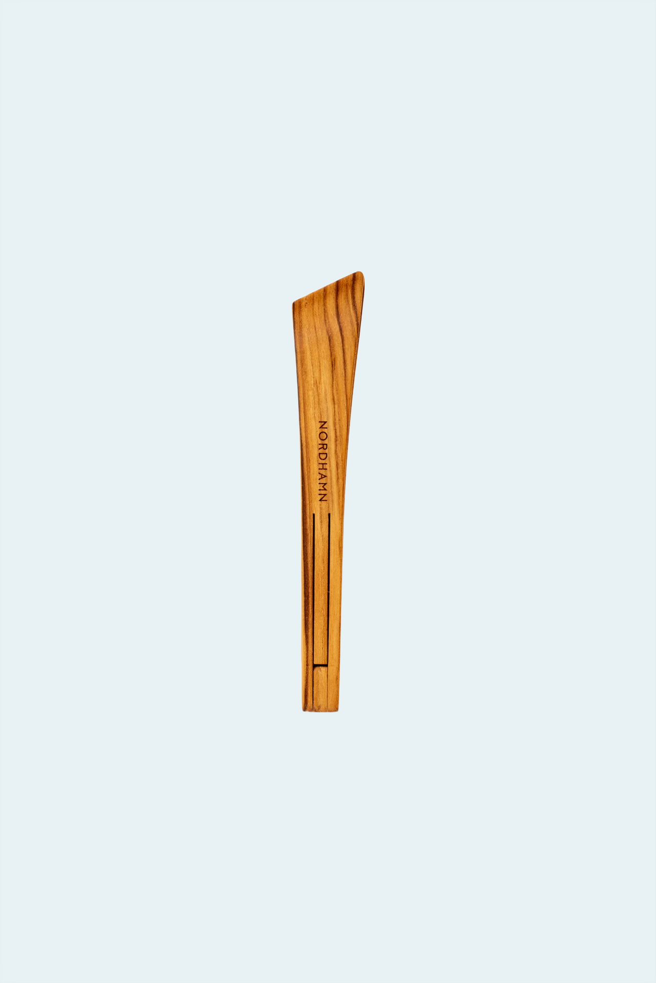 Tång, 33 cm, i teak mot ljus bakgrund
