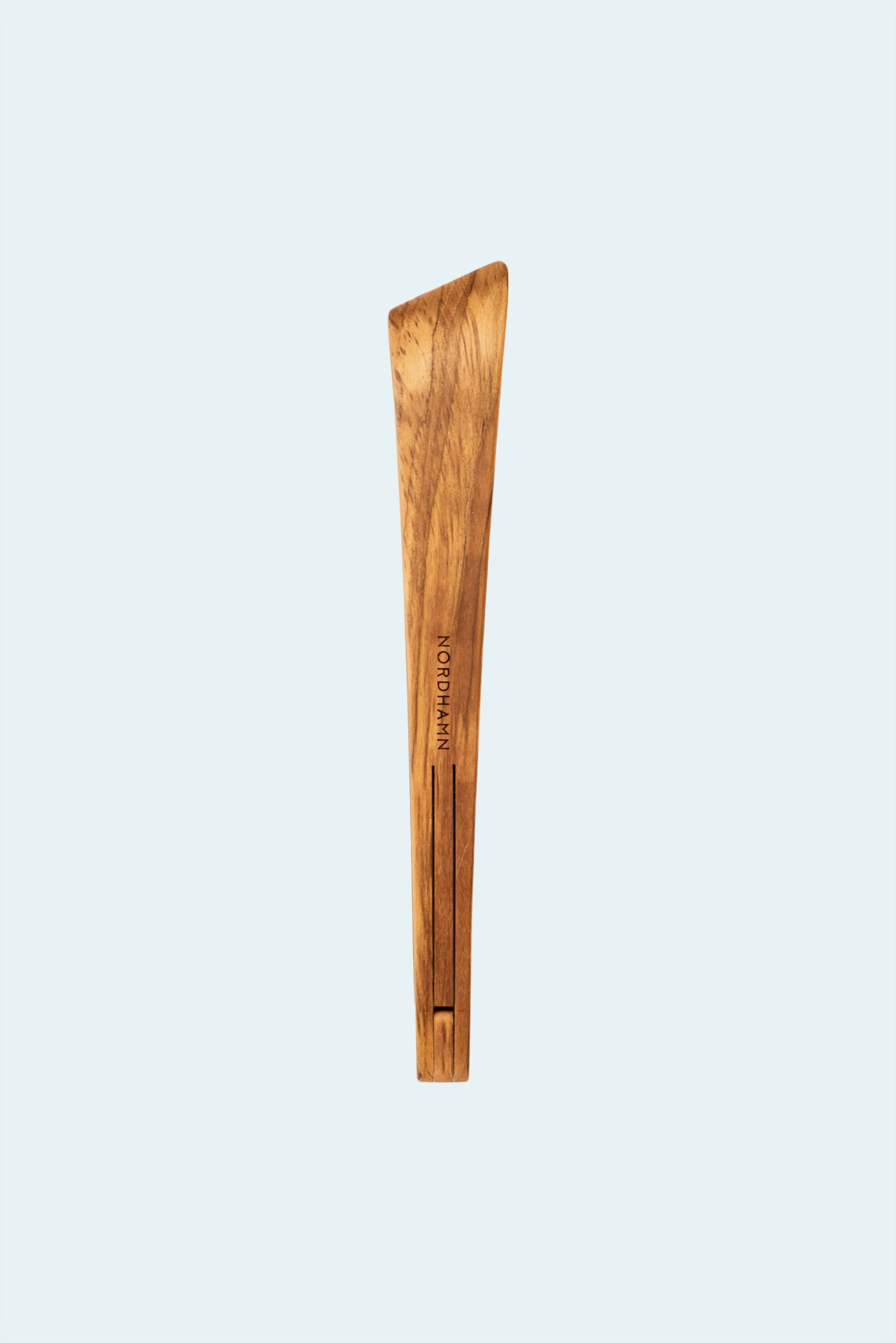 Tång, 33 cm, i teak mot ljus bakgrund